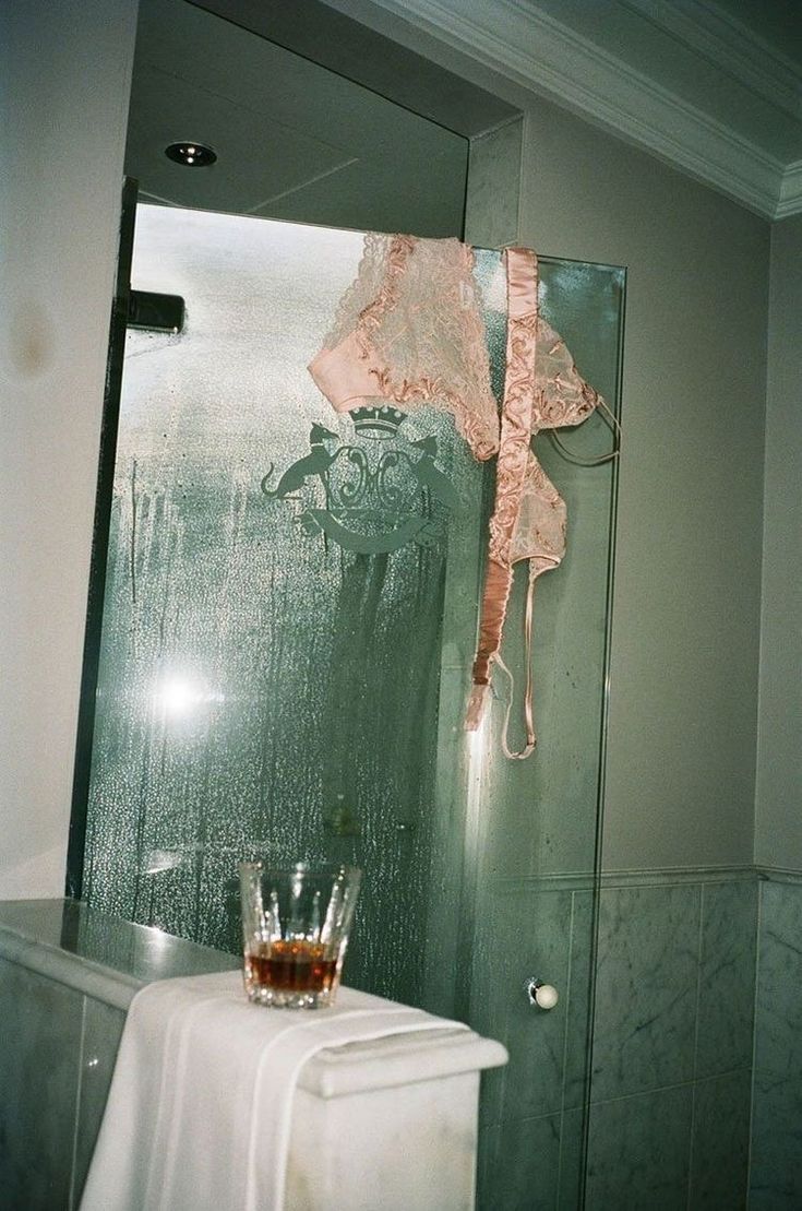 Vintage bathroom mirror with lace and self-care details